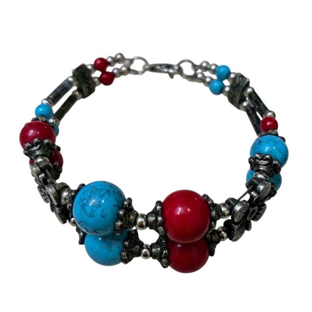 Hand Crafted Silver, Red, and Blue Beaded Bracelet